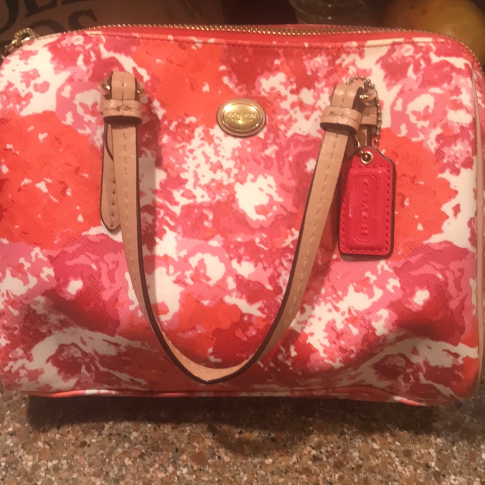 Coach multi color floral handbag